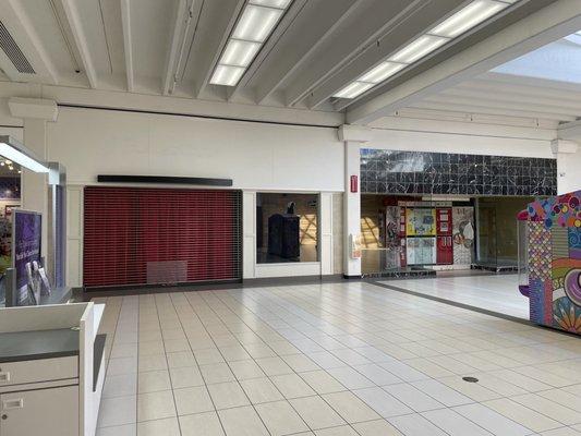 Empty store spaces all over the mall