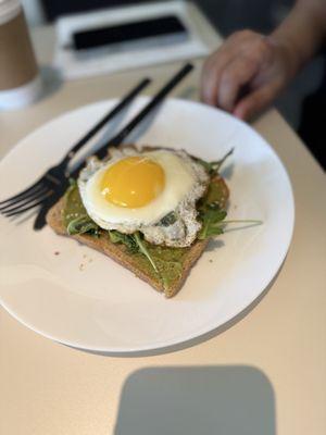 Avocado toast with sunny-side-up egg