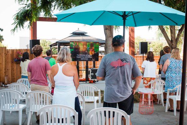 Outdoor venue on front patio to watch a live feed of the service outside.