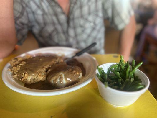 Country fried steak, mashed potatoes, and green beans