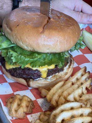 Cheeseburger and waffle fries