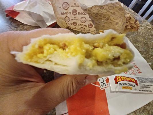 Inside of breakfast bacon egg burrito