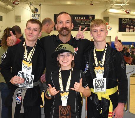 Coach RJ with a few of our kids Brazilian jiu jitsu team