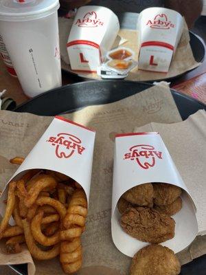 Chicken nuggets and curly fries