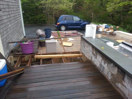 Memorial day  weekend with deck torn apart and kit strewn across driveway patio and lawn