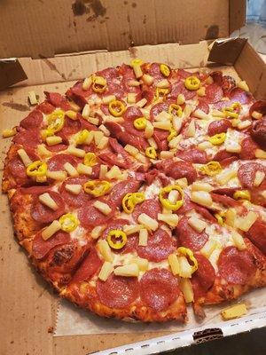 Pineapple, banana pepper and pepperoni pizza