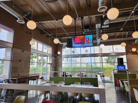 The Dining area with a beautiful sized television