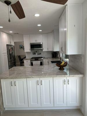 White shaker modern remodel kitchen cabinets at San Diego vanities and kitchens cabinet store quartz countertop