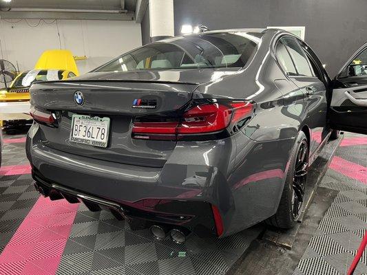 Check out this 2022 BMW M5 Competition in our Xpel clear bra room!