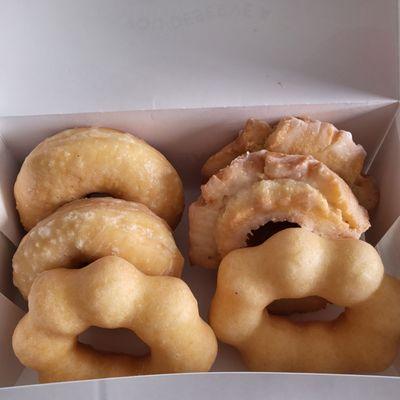 Clockwise: Glazed raised, Glazed old-fashioned and Glazed Mochi donuts on the bottom.