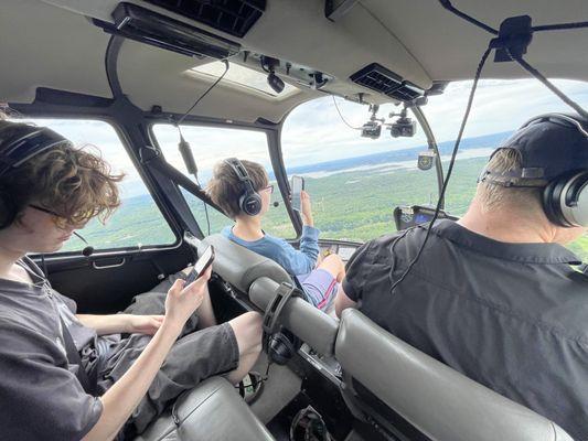 My kids taking videos and our pilot