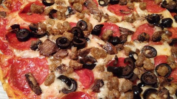 Pepperoni, sausage, mushrooms and black olives.