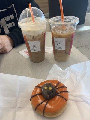 Pumpkin latte on left vanilla latte on right. Spider donut