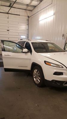 Jeep Cherokee in the shop getting ready for a Windshield Replacement.