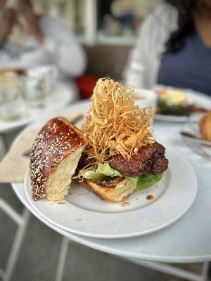 Fried chicken sandwich with haystack potatoes