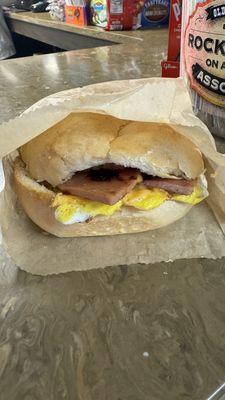 Bologna breakfast sandwich with egg, cheese, and added a hash brown