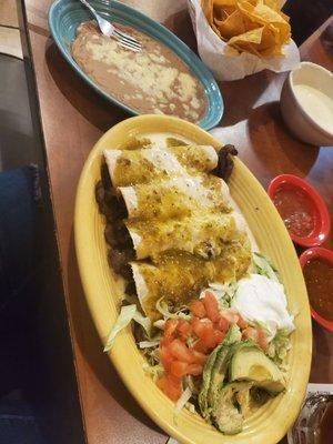 Enchiladas suizas - steak Enchiladas with cheese dip and Verde sauce - so good!