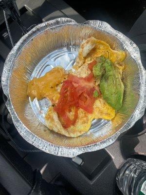 Requested scrambled eggs with tomato, avocado and American cheese. Picture says a lot.