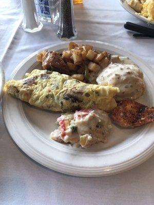 Omelette biscuits and gravy and potatoes yum yum