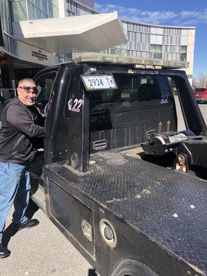 Look how happy he is just towing cars