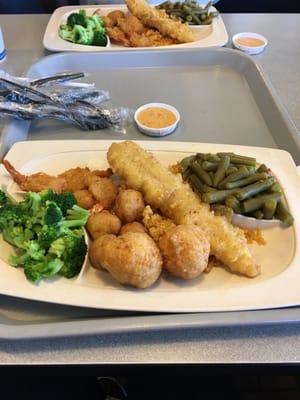 Lobster bites, fish and shrimp meal with green beans and broccoli.