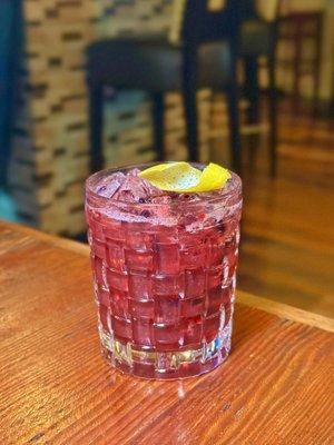 Athenas Kiss (orange amaro, otto's sweet vermouth, fresh lemon, blackberries, lemon twist)