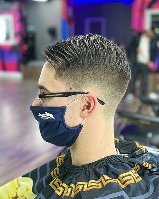 Taper fade complimenting the customers head shape.