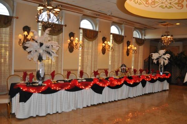 Hooray for Hollywood, in red and black.  Feather centerpiece.