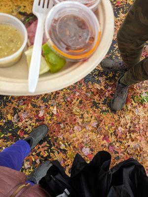 Eating under a tent because of rain