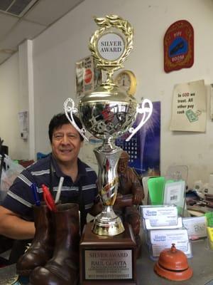 Master Shoe Repair owner RAUL GUAYTA  with his SILVER AWARD  trophy from The Shoe Service Institute of America's 2015 World Cup Contest!