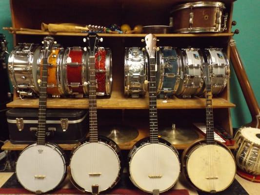 Vintage banjos and snares.