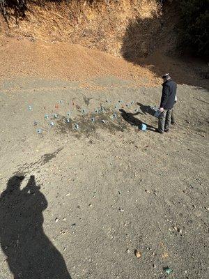 Setting up the cans before blasting them into pieces