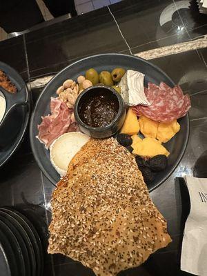 BUTCHER'S BOARD- assorted cheese and charcuterie, citrus-marinated olives, lavosh crackers