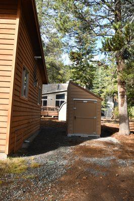 Perfect setting along property line! Nice match of color and shape of roof