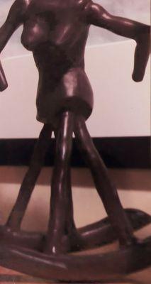 Rocker Woman by Elona VanGent- cast bronze made for a fundraising show at the Grand Rapids Art Museum