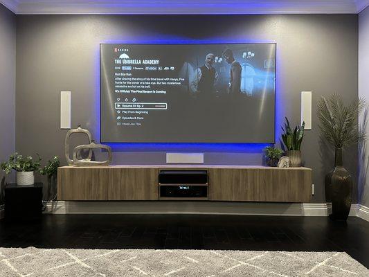 7.1 Home Theater System paired with a 4k Ultra Short Throw Projector and 4K 100" Projector Screen Installation.