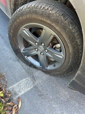 This is what happens if you hit a granite curb. Thank you, Mark for helping me get home safely.