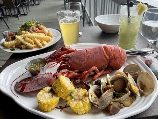 Maine lobster roll and traditional lobster bake