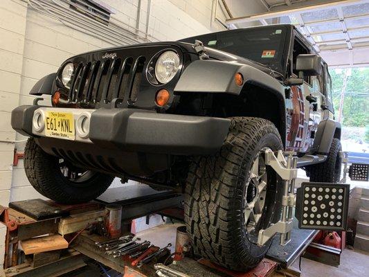 Custom Jeep getting a wheel Alignment.