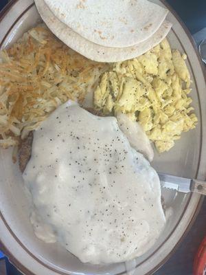 Chicken fried steak, scrambled eggs, hashbrowns