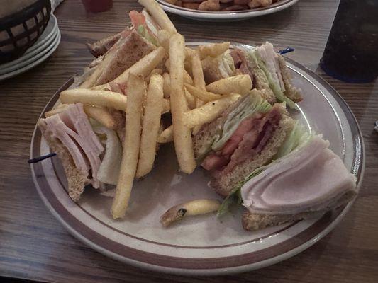 Turkey club and French fries.