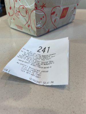 Ticket with the time of the order and time we got it. More than 20 minutes waiting for our meals.