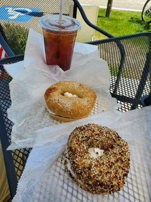 Everything bagel toasted with plain cream cheese.  Salt bagel toasted with plain cream cheese.  Large black iced tea.