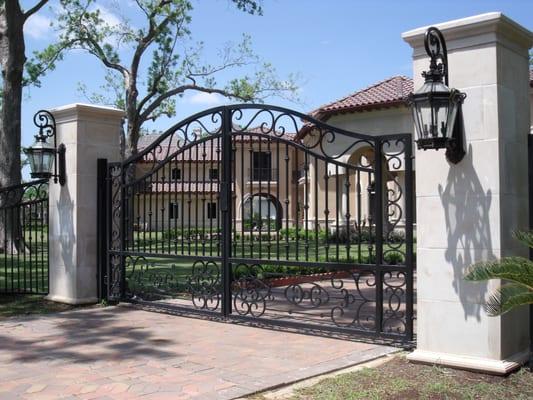 Scroll gate with cast stone columns