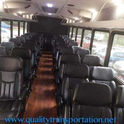 Black Luxury 45 passenger Shuttle Bus