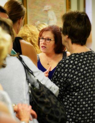 Dr. Lori Greenwald surrounded by hundreds of people who came out to see her at her open house.