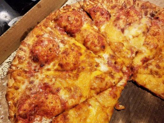 Improperly proofed dough or dough that is cooked too cold results in crust bubbles as pictured on this Big Cheese...not much cheese, either.