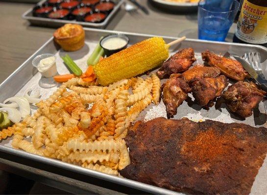 WINGS & RIBS (1/2 rack of ribs, small order of hickory smoked bone-in wings, French fries, corn on the cob, and cornbread)