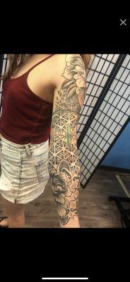 Full sacred geometry/crystals/flower sleeve that I LOVE and is now a huge element to my signature look thanks to Lucas!