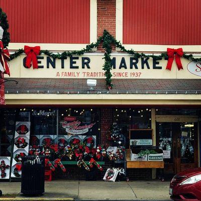 Display of holiday wreaths out front